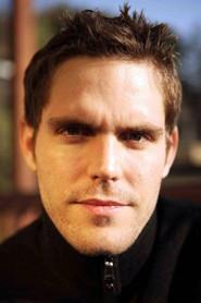 Brad T. Gottfred as Baxter in Orgies and the Meaning of Life 2008