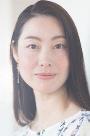 Yasue Sato as Mina in Ultraman Zero: The Revenge of Belial 2010