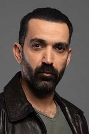 Mehmet Bozdoğan as Orhan Korkmaz in Adreste Bir Sorun Var 