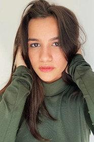 Ana Eliza Chaves as Kelly in O Vazio de Domingo à Tarde 2024