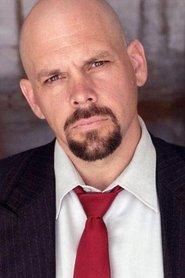 Michael McKay as Mr. E. in King of the Streets 2009