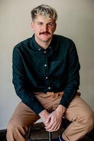 Gaston Stabiszewski as Documentarian in Pete Clarkson: SerpentStone Equity 2024