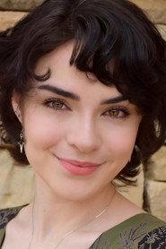Parker Paige as Blair Hicks in Heraldry Paranormal 2026