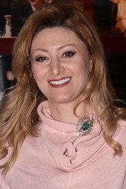 Katerina Sasli as  in Enas gamos, mia kideia kai mia voulgara 2005