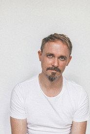 Johannes Semm as Rezeptionist in On Standby