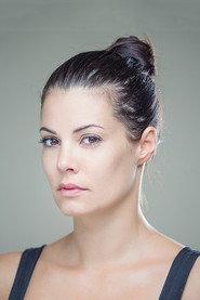 Maria Korinthiou as Eleni Theofilou in I-4: Loafing and Camouflage 2008