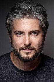 Curran Connor as The Man in Crybaby 2017