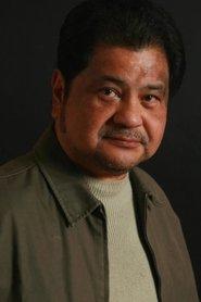Joselito Rescober as Dr. Fuji in Killing American Style 1988