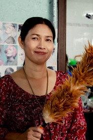 Taksunapron Pummalee as Noi(Mother) in Before the World Ends 2025