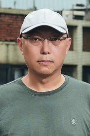 Danny Deng as Counselor Chief in Dust in the Wind 1986