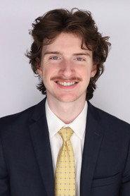 Alex Ambro as Greg in Operation: Laugh Track 2025