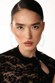 Zhibek Bainazarova as Waiting Room Guest in Coffin Therapy 2026