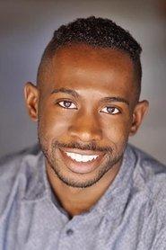 Andrel McPherson as Africa in The Day Shall Come 2019