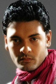 Abhinay as Guru in Solla Solla Inikkum 2009