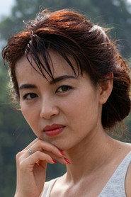 Akemi Kogawa as Azusa in Roppongi Banana Boys 1989