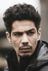 Anis Benbatoul as Kouame in Earth and Blood 2020