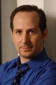 Peter M. Karlin as Lt. Frost in Hot Ice, No-one Is Safe 2010