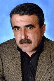 Bahram Osmanov as Percussionist / Fortune teller / Karbalayi in Hungry Fellows 1993