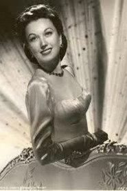 Roma Aldrich as Nita Dominick in Parachute Nurse 1942