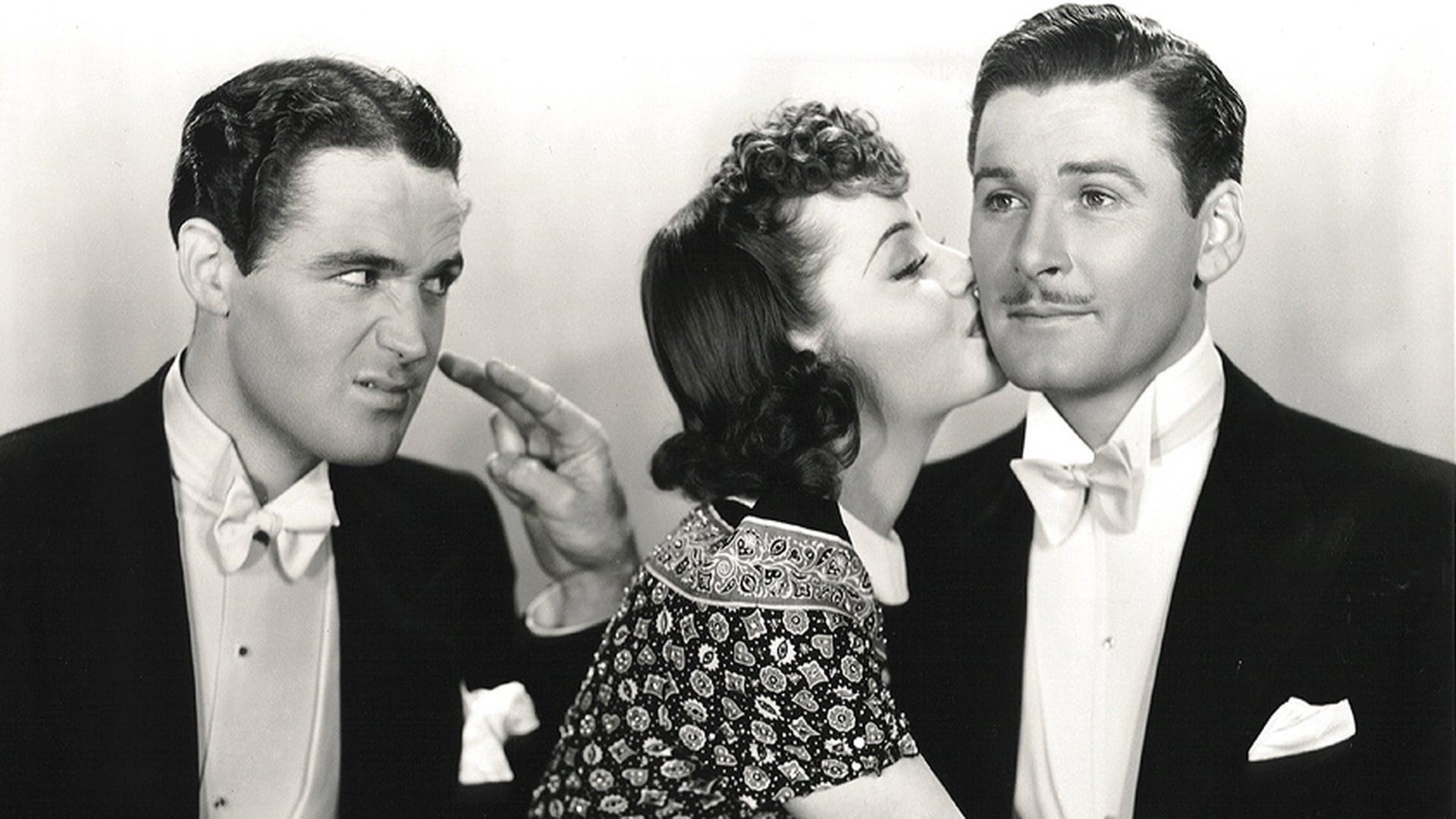 Four's a Crowd 1938 movie scene