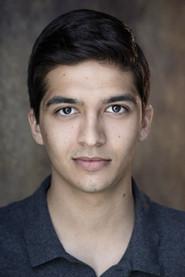 Luke Latchman as Wireless Commentator / Terry / Dior Dressmaker / Terence in Flowers For Mrs. Harris 2020