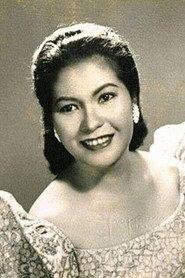 Rosa Mia as Ms. Cristina in Sandra 1959
