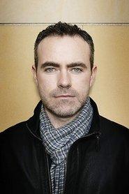 John Crowley as Self - Director ("Come and Go") in Check the Gate: Putting Beckett on Film 2003
