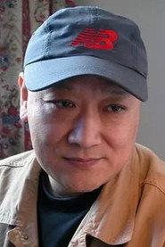 Zhang Jianwei as in Si li tao sheng 1988