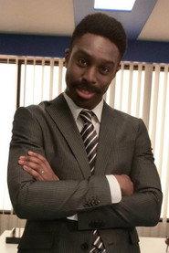 Ike Nwala as Director Samuel Hilltop in Kaitou Sentai Lupinranger VS Keisatsu Sentai Patranger en film 2018