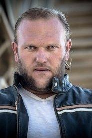 Errol Sack as Dog Trainer in A Doggone Hollywood 2017