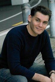 Graham Sack as Brian Grant in Dunston Checks In 1996