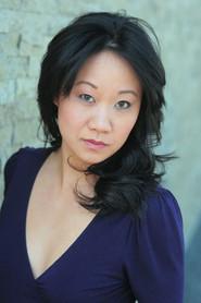 Elaine Ann Hu as Officer Xi'an in 5th Passenger 2018