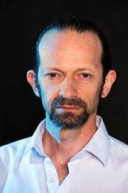 Aleksander Mincer as Kaczmarek in The Auschwitz Report 2021
