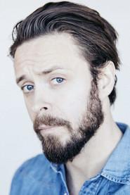 Petur Oskar Sigurdsson as The American Guy in House of VHS 2015