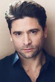 Nathan Todaro as Chuck in The Caretaker 2025