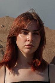 Flora Nolan as Captain H. H. in Love Bomb Baby 2024