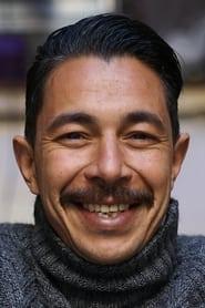 Omar Boulakirba as Si Ahmed in Harkis 2022