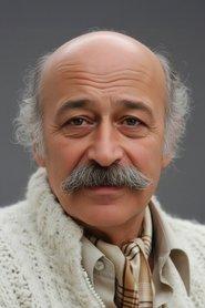 Mete Sezer as Barkeeper in The Eagle's Nest 1974