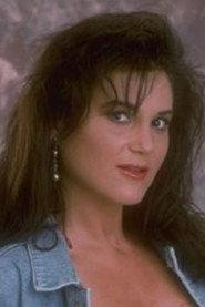 April Rayne as Sabra in Hold Me Thrill Me Kiss Me 1992