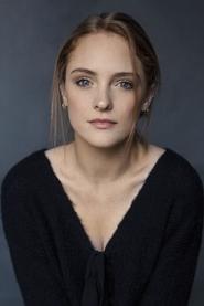Mélanie Robert as Camille in Dans l'ombre des dunes 2022