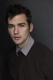 Samuel Caleb Walker as Henry in The Mad Hatter 2021