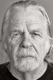 John Douglas as Truck Driver in The Naked Hitch-hiker 2006