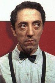 Claude Melki as Le barman in Threshold of the Void 1974