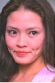 Ling Doi as Assistant in The Foxy Ladies 1979