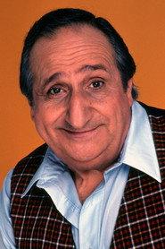 Al Molinaro as Al Delvecchio ("Buddy Holly") in Weezer: Video Capture Device - Treasures from the Vault 1991-2002 2004