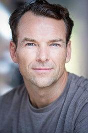 Michael Absalom as Phil in Extinction 2018