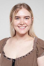 Charlotte Brassil as Ainslee Porter in A Murderous Melody 2023