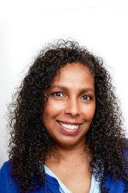 Lynnette Kissoon as English Professor in Stranger in Town