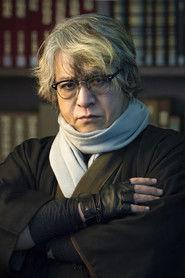 Natsuhiko Kyogoku as Kouichi Aizawa (voice) in Kindaichi Case Files Movie 2: Deep Blue Massacre 1999