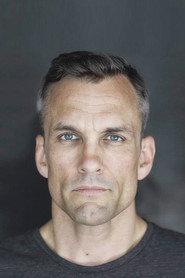 Sean Bell as Lt. Tim Macy in One Kill 2000